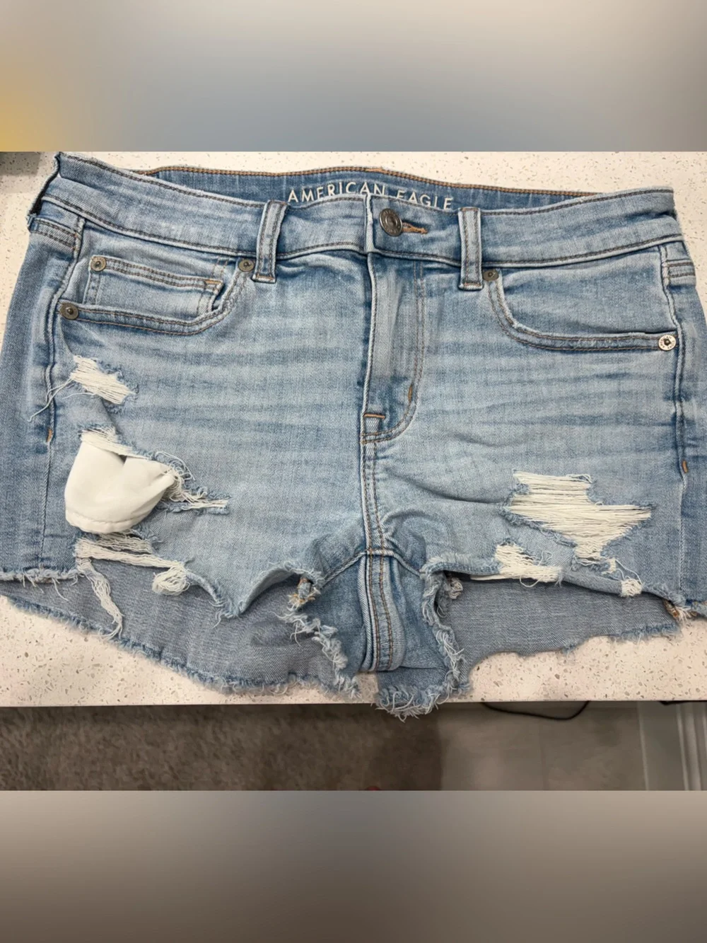 Light Wash Distressed Denim Shorts